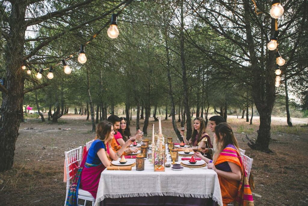 An interfaith wedding party sat at a wedding table