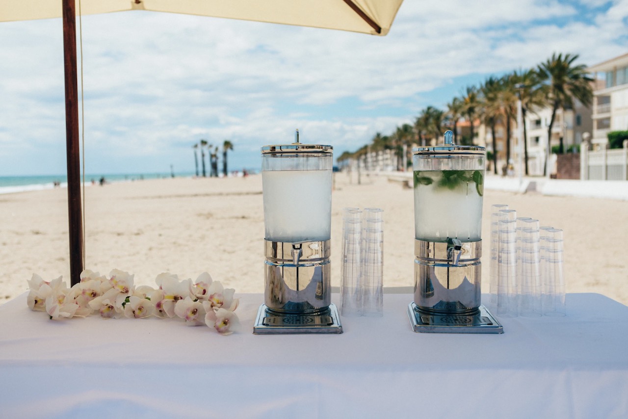 Drinks set up on a beach