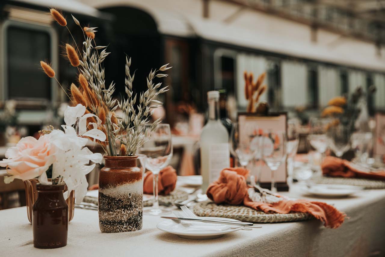 A wedding table set up with dried plants