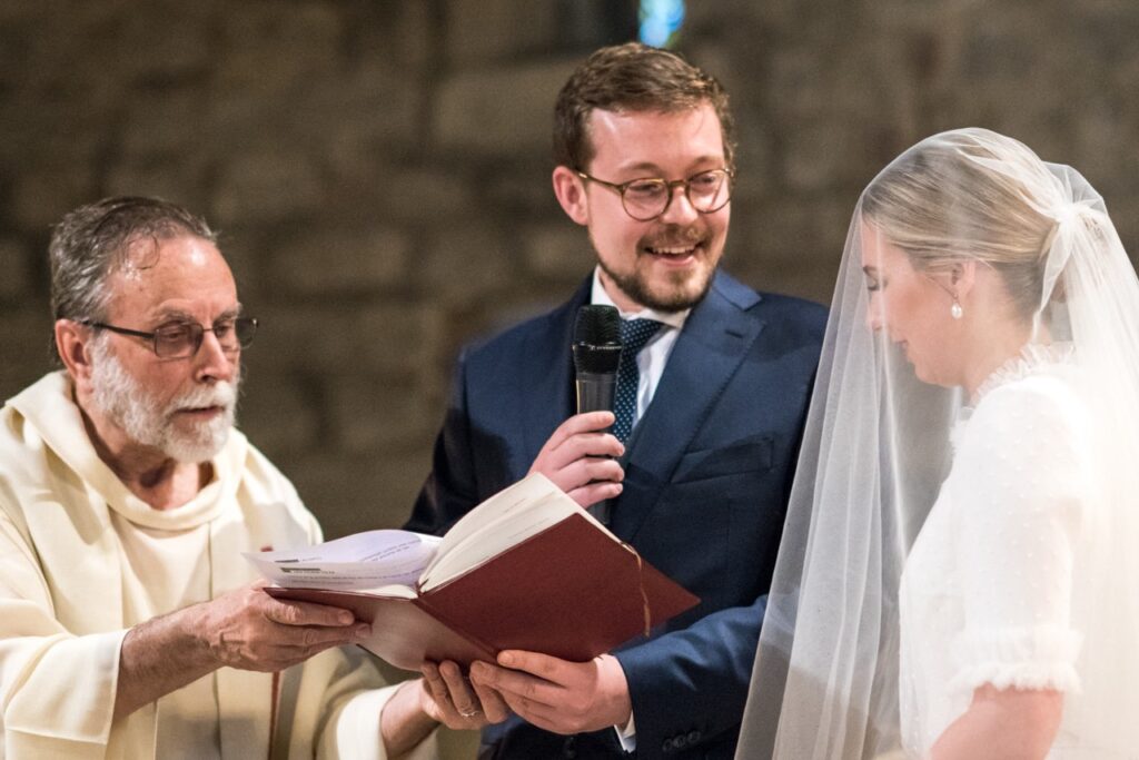 A bride and groom having a religious ceremony