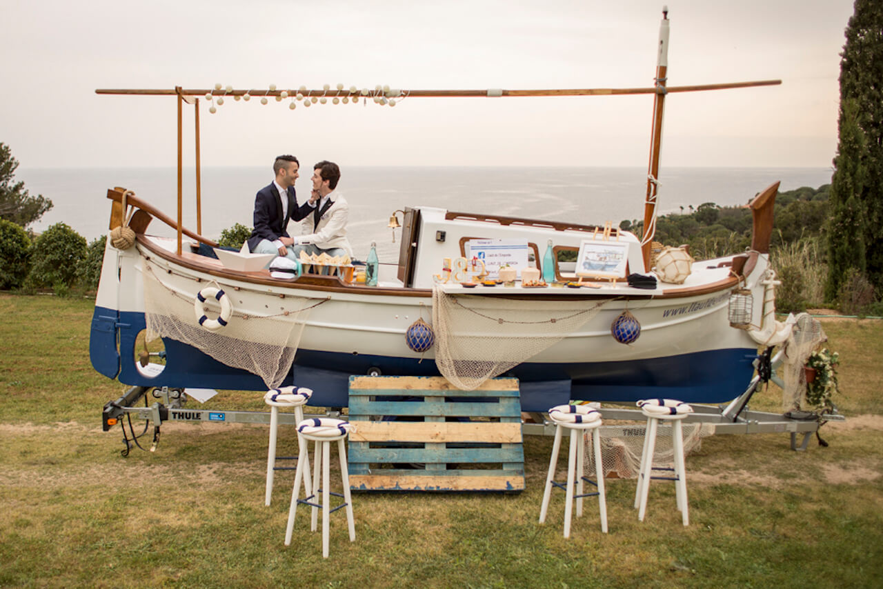 A boat in a field set up for a wedding