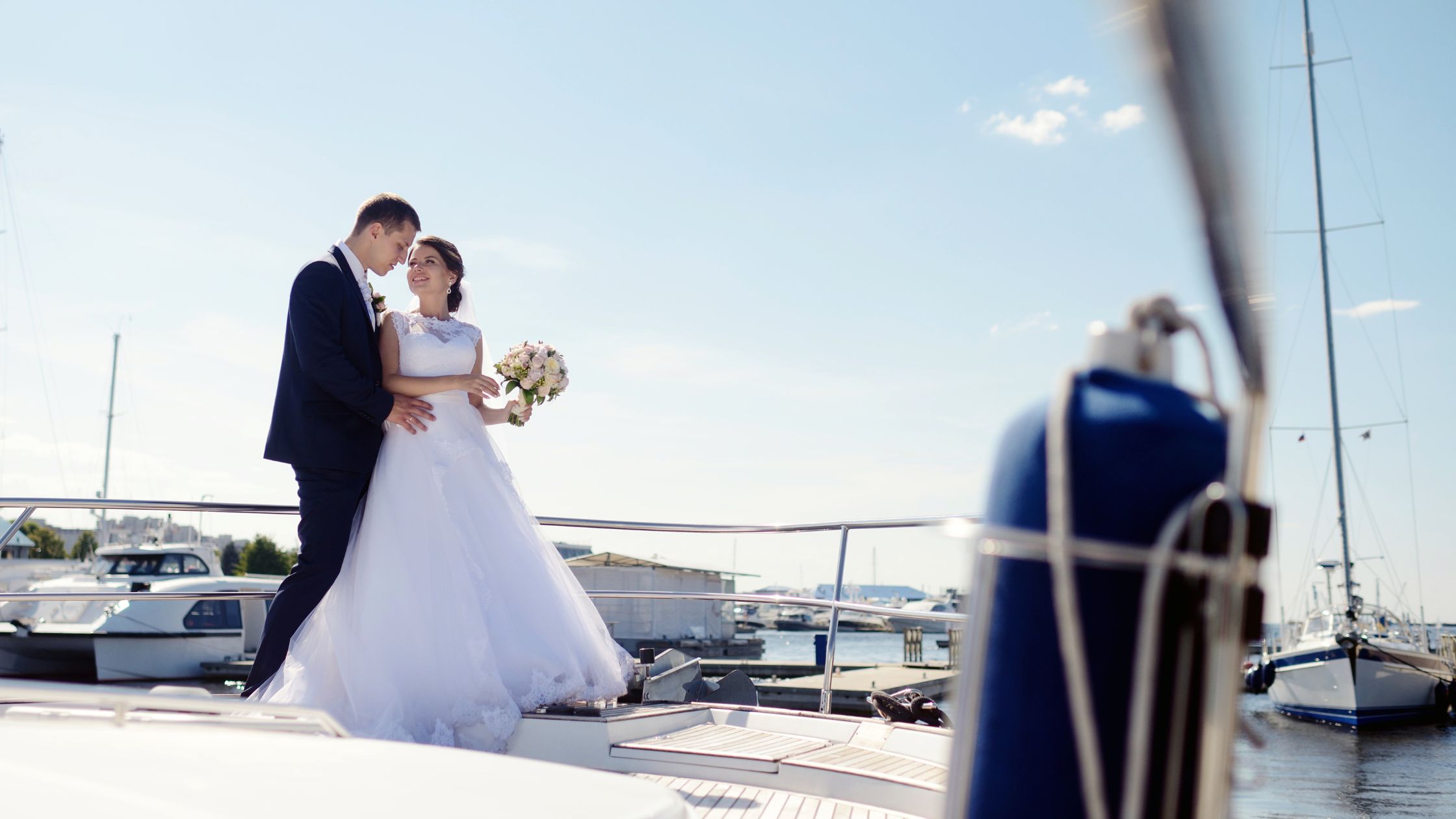 A loving couple at their yacht wedding